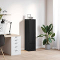 Hochschrank mit den Massen 29.5 x 34 x 119.5 cm in Schwarz und Eichenbraun
